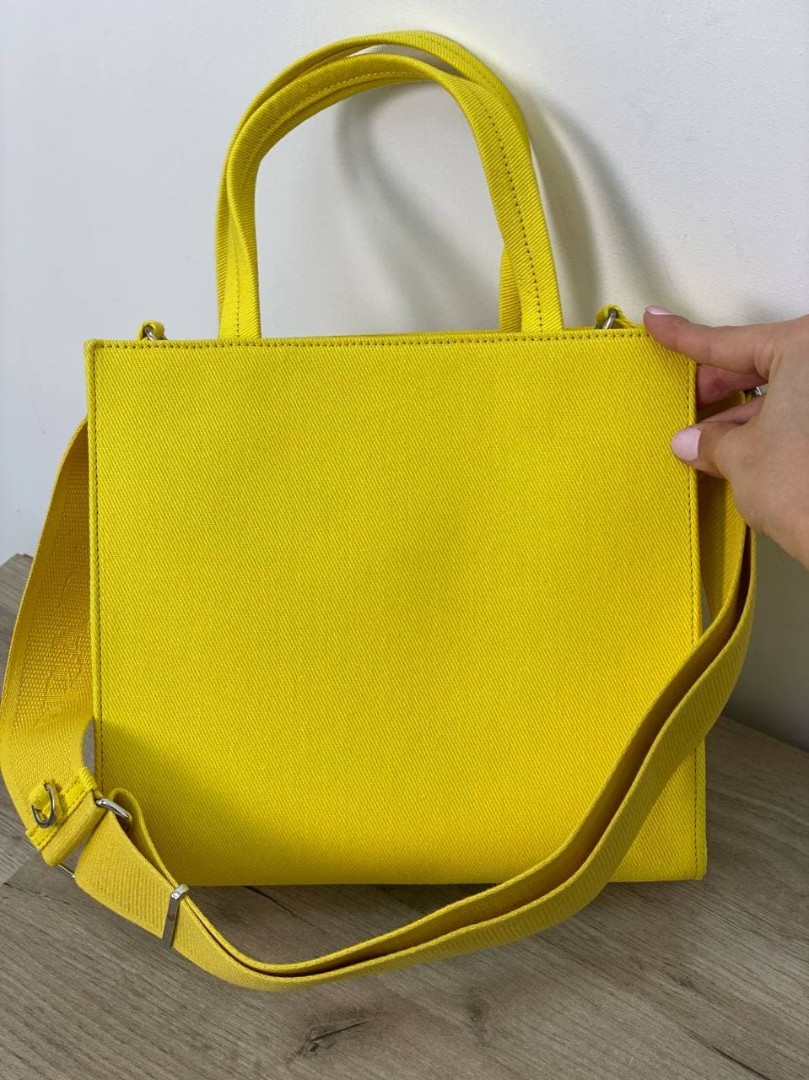Женская желтая сумка Prada