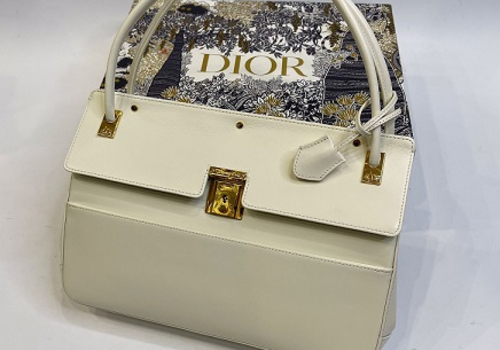 Женская сумка Christian Dior молочная