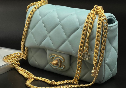 Кожаная голубая сумка Chanel 2.55 Mini