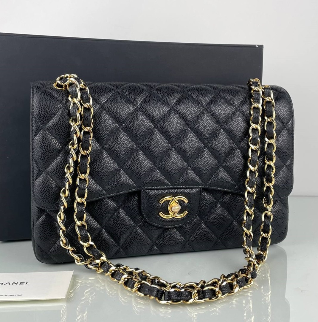 Женская черная кожаная сумка Chanel 11.12 Jumbo Classic Flap Bag