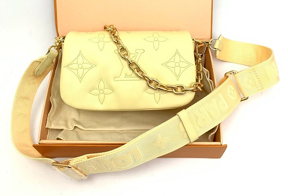 Женская желтая сумка Louis Vuitton