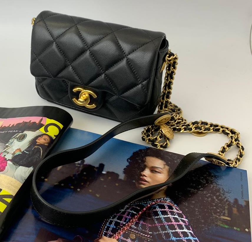 Черная кожаная сумочка Chanel 2.55 Mini