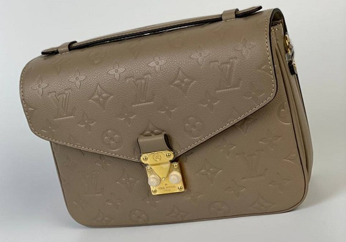 Бежевая сумка Louis Vuitton Pochette Metis