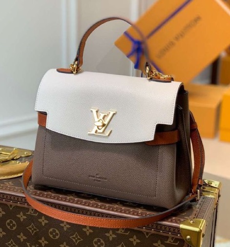 Кожаная сумка Louis Vuitton Lockme Ever