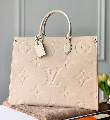 Женская кожаная сумка Louis Vuitton Onthego GM молочная