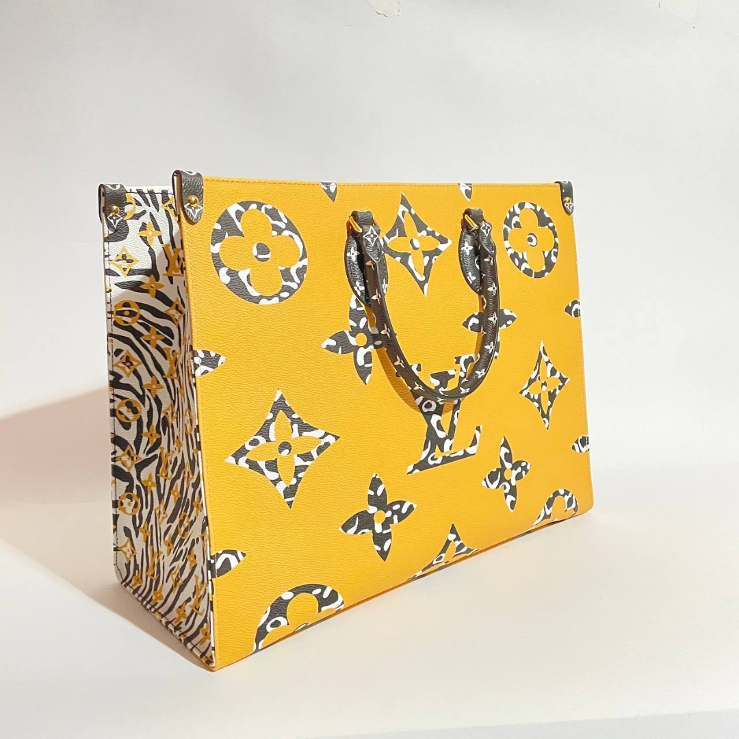 Женская кожаная желтая сумка Louis Vuitton Onthego MM