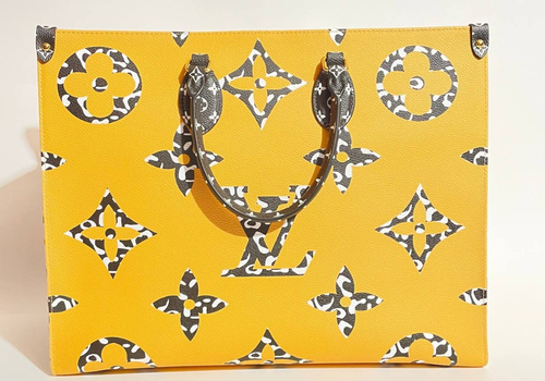 Женская кожаная желтая сумка Louis Vuitton Onthego MM