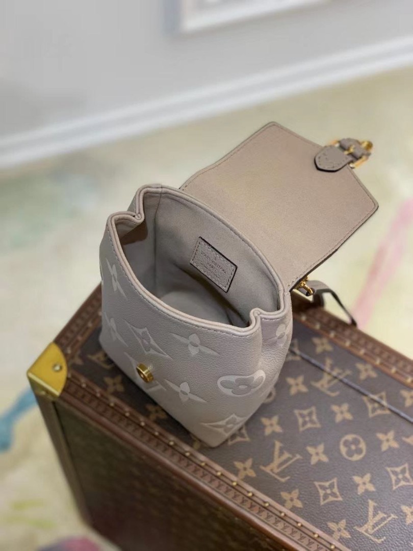 Серый кожаный рюкзак Louis Vuitton The Tiny Mini