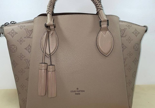 Женская кожаная сумка Louis Vuitton Haumea бежевая