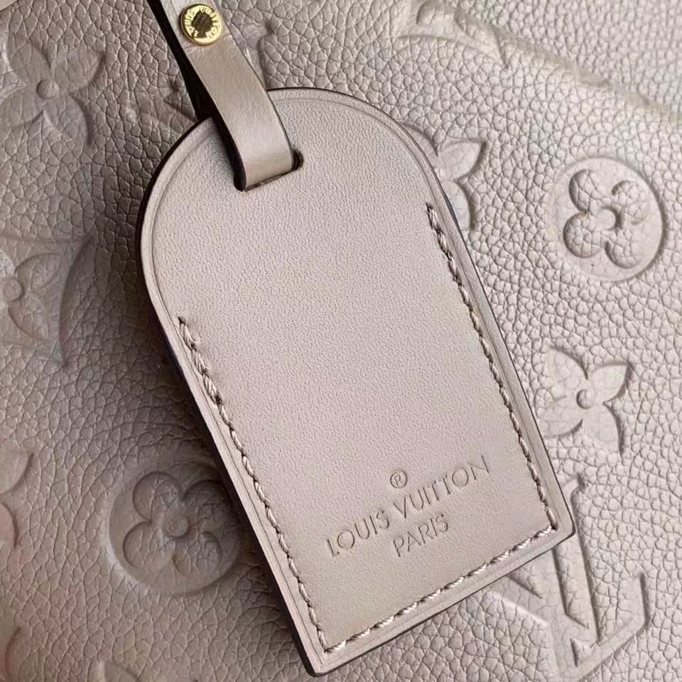 Кожаная сумка Louis Vuitton V Tote бежевая