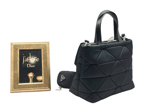 Женская дутая черная сумка из текстиля Prada