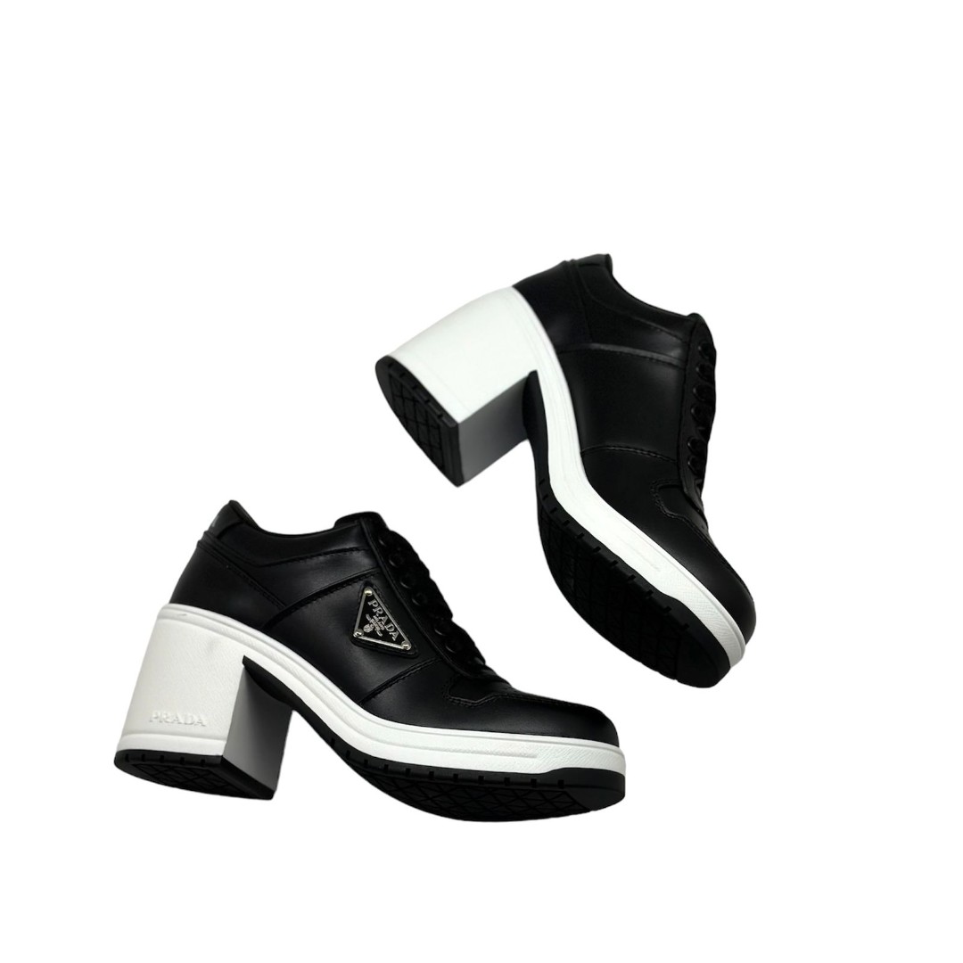 Женские кожаные черные ботинки Prada на каблуке