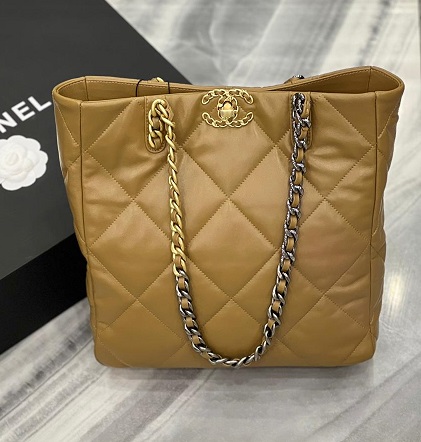 Кожаная коричневая сумка Chanel