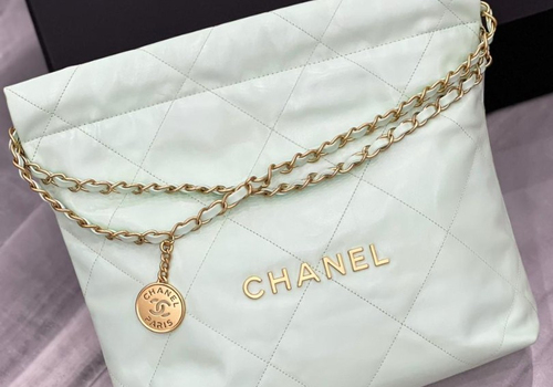 Женская кожаная сумка Chanel 22 голубая