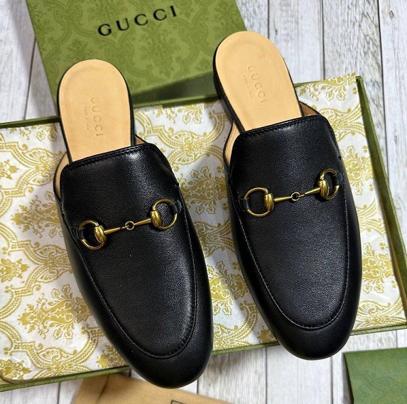 Женские черные кожаные мюли Gucci