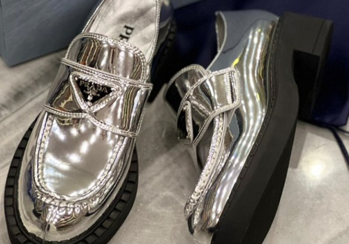Кожаные серебристые женские ботинки Prada
