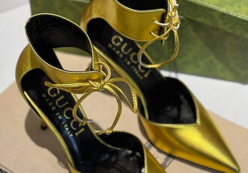 Женские кожаные золотые туфли Gucci