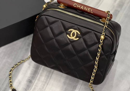 Кожаная черная сумка Chanel Mini Bowling