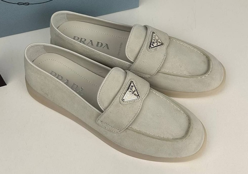 Замшевые белые женские лоферы Prada Suede