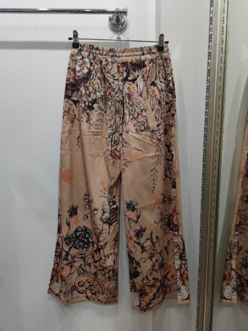 Женские широкие бежевые джинсы на резинке Christian Dior