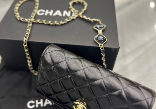 Черная кожаная сумка конверт Chanel