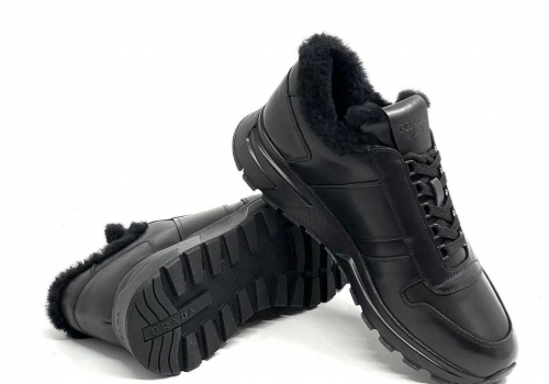 Черные кожаные кроссовки с мехом Prada