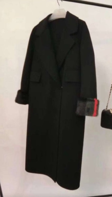Черное женское пальто Gucci