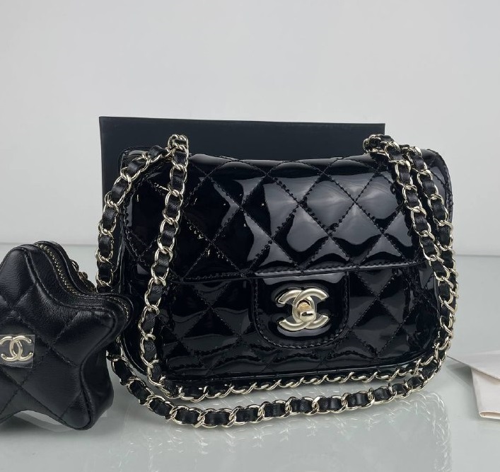 Кожаная черная сумочка Chanel Star Coin Purse Mini