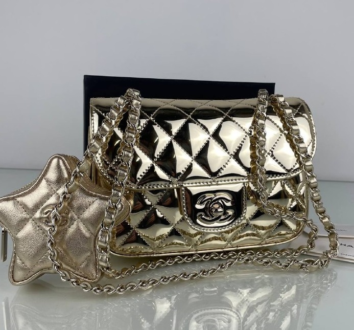 Кожаная золотая сумочка Chanel Star Coin Purse Mini