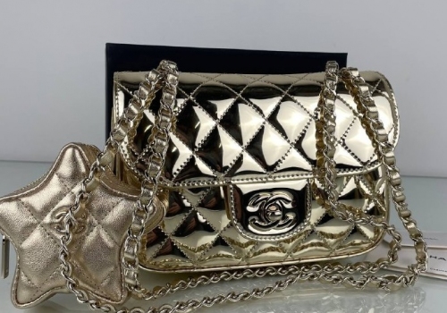 Кожаная золотая сумочка Chanel Star Coin Purse Mini