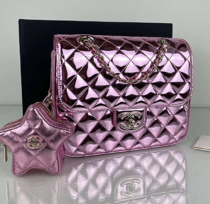 Кожаная розовая сумка Chanel Star Coin Purse