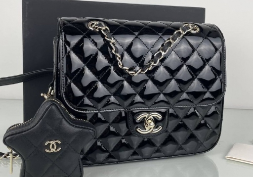 Кожаная черная сумка Chanel Star Coin Purse