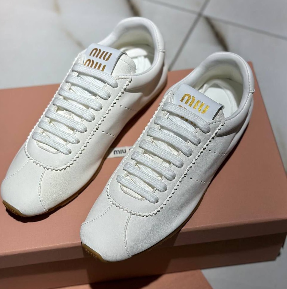 Женские кожаные кроссовки Miu Miu белые