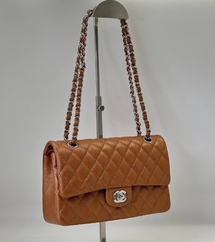 Кожаная коричневая сумка Chanel 11.12 Medium Classic Flap Bag