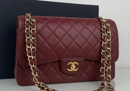 Женская бордовая кожаная сумка Chanel 11.12 Jumbo Classic Flap Bag