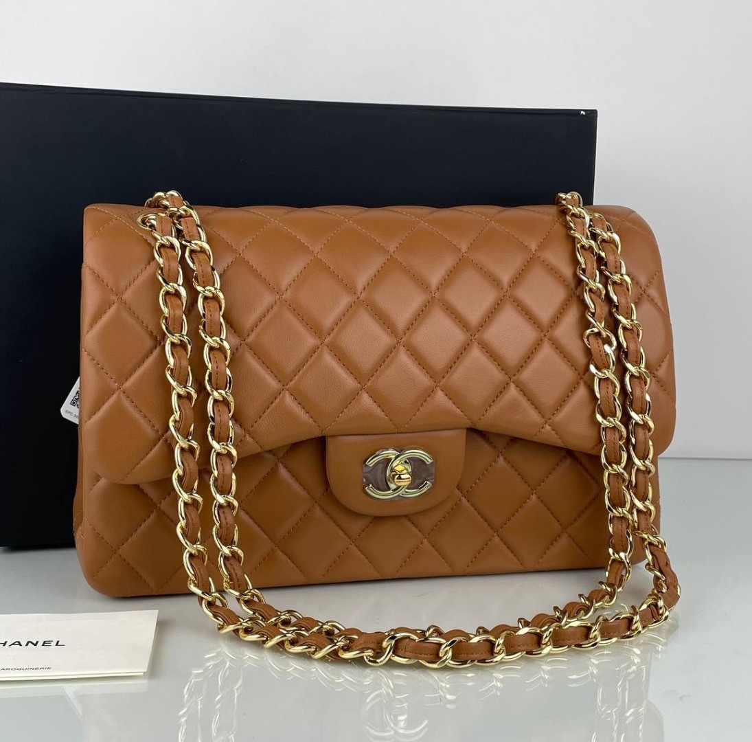 Женская коричневая кожаная сумка Chanel 11.12 Jumbo Classic Flap Bag