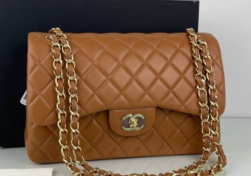 Женская коричневая кожаная сумка Chanel 11.12 Jumbo Classic Flap Bag