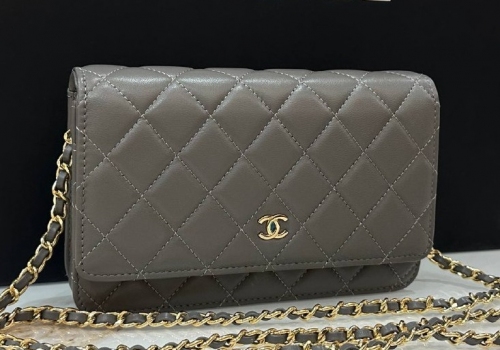 Женская серая кожаная сумочка Chanel Woc золото