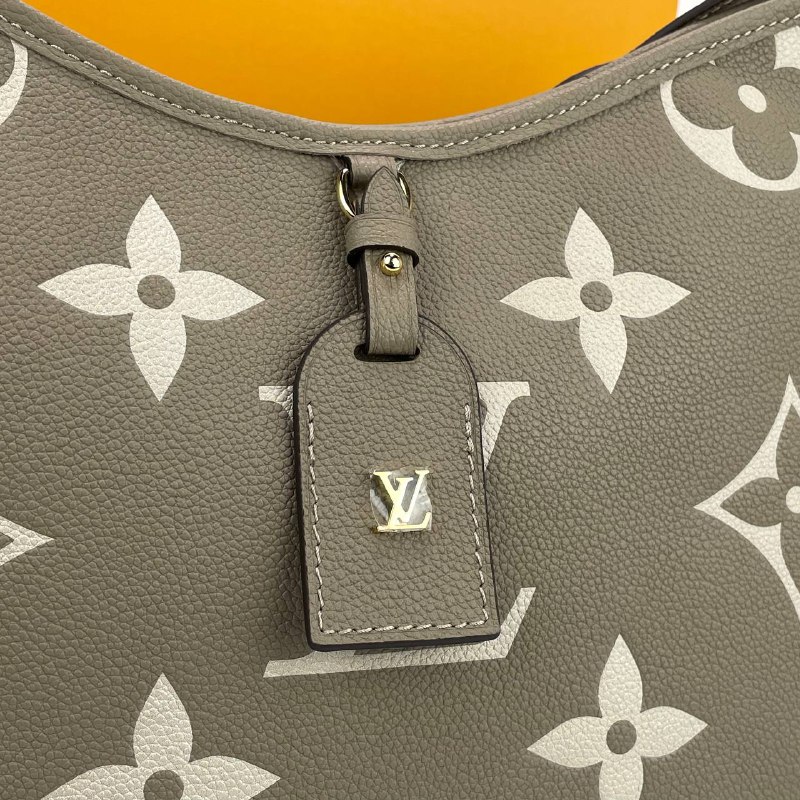 Женская кожаная сумка Louis Vuitton Carry All PM серая