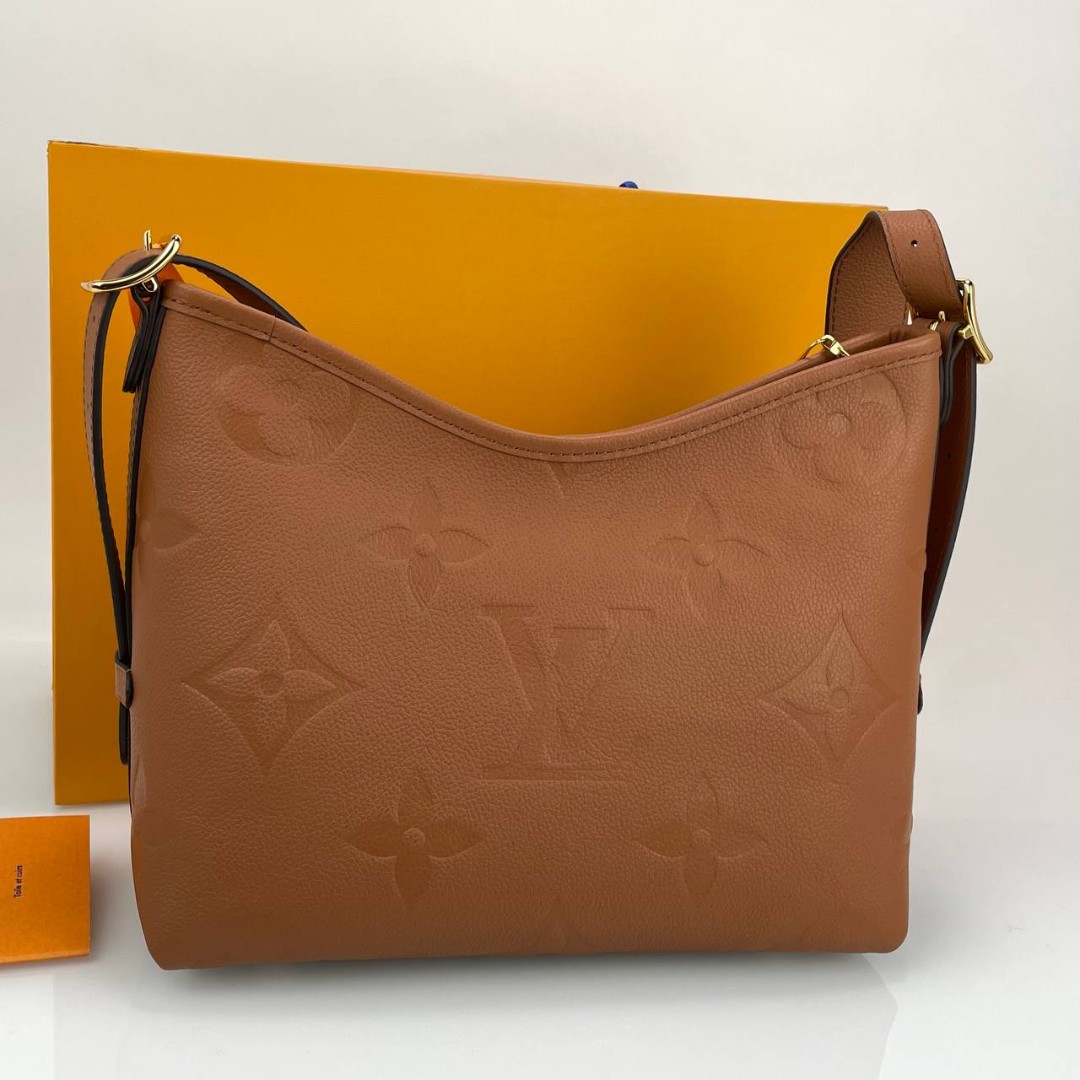 Женская кожаная сумка Louis Vuitton Carry All PM коричневая