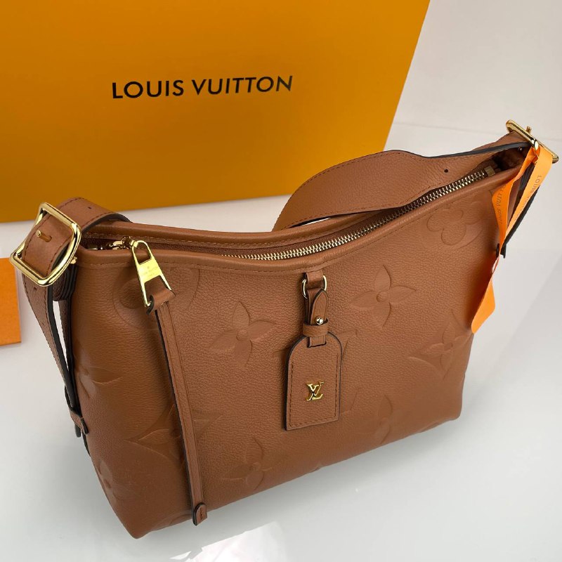 Женская кожаная сумка Louis Vuitton Carry All PM коричневая