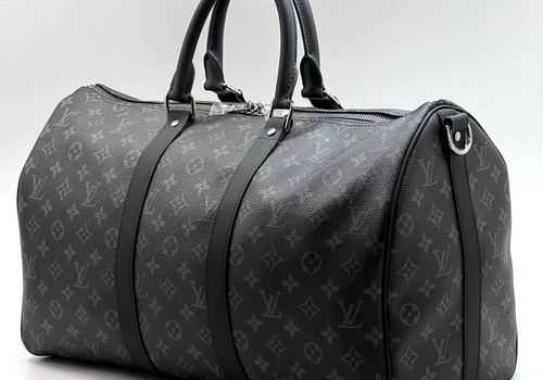 Серая сумка Louis Vuitton Keepall