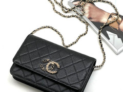 Черная сумочка Chanel Woc